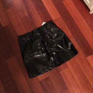 Black faux patent leather mini skirt